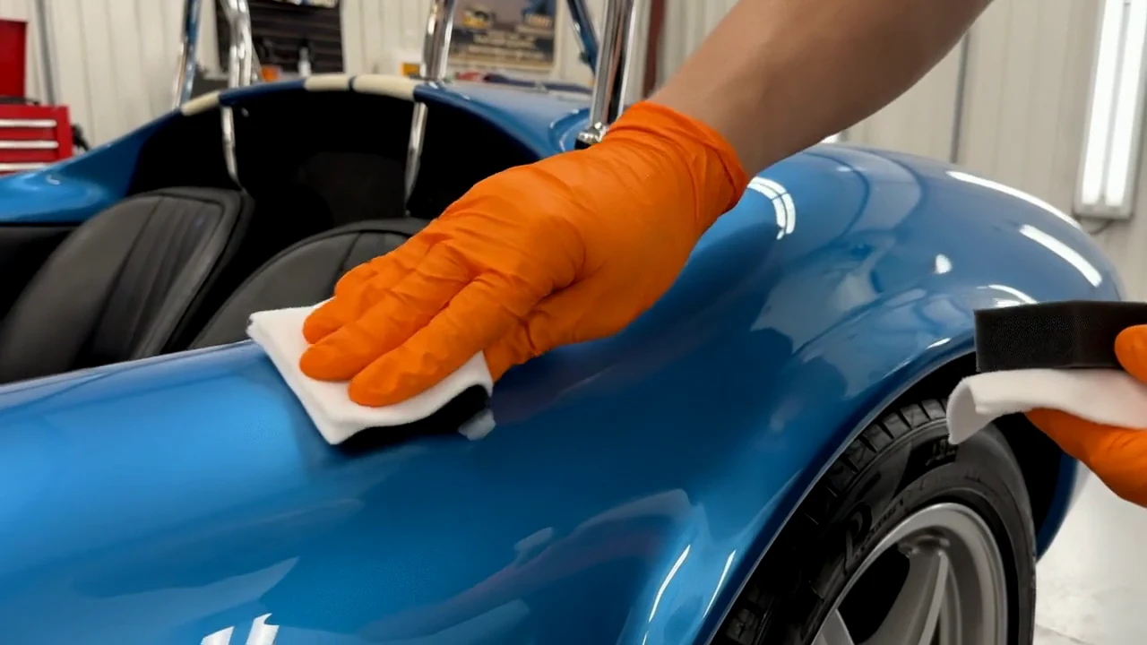 Coating applied by hand to a vehicle finish Coating applied by hand to a vehicle finish