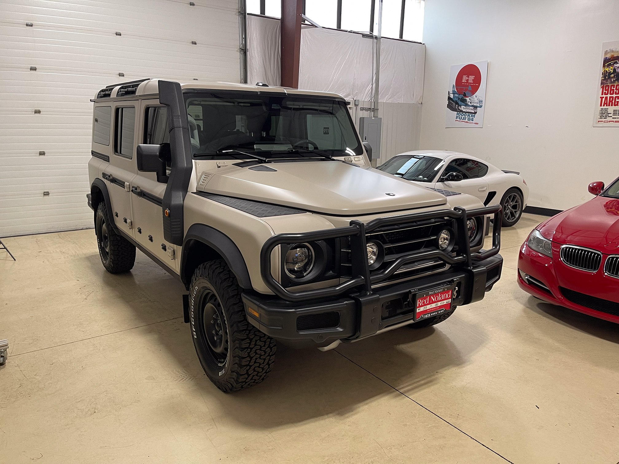 Beige INEOS Grenadier with a satin finish inside the Auto Vos workshop Beige INEOS Grenadier with a satin finish inside the Auto Vos workshop